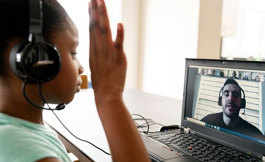 A girl having an online coding class